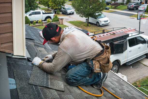 Professional Roofing technician working in Weehawken, NJ